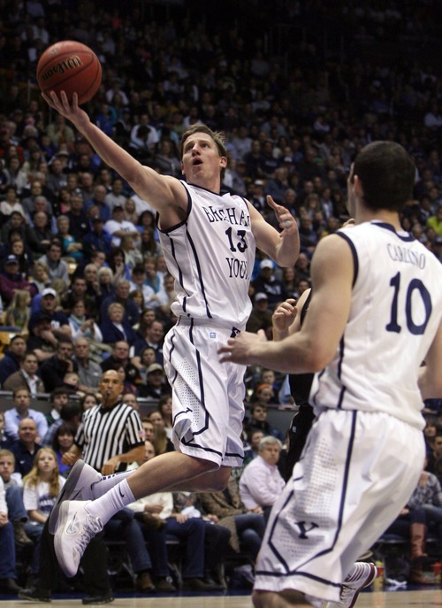Kim Raff  |  The Salt Lake Tribune
Brigham Young Cougars guard Brock Zylstra (13) shoots the ball against the Santa Clara Broncos during a game at the Marriott Center in Provo on February 2, 2013.  BYU went on to win 96-79.