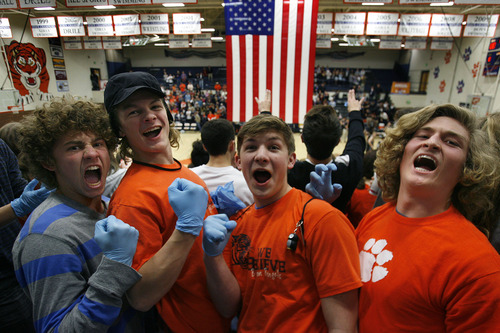 Scott Sommerdorf   |  The Salt Lake Tribune
Brighton students get psyched after the national anthem at Brighton. Alta led Brighton 34-25 at the half at Brighton High, Friday, February 1, 2013.