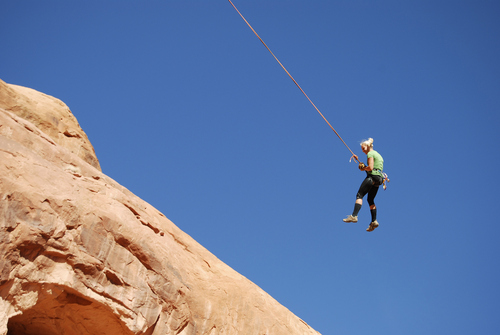 Brian Maffly | The Salt Lake Tribune 
Corona Arch near Moab has become what is billed as the world's largest rope swing after climbers figured out how to adapt climbing gear to set up a thrilling 250-foot pendulum ride under the arch. Concerned with liability issues, state officials recently shut down the arch, which is on state-owned land, for commercially guided swinging, pictured here on Nov. 4.