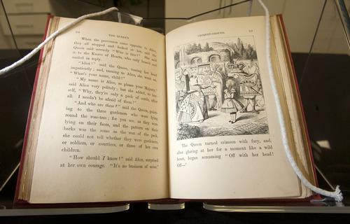 Steve Griffin | The Salt Lake Tribune
A rare first edition of Lewis Carroll's "Alice's Adventures in Wonderland", pictured, was acquired by the University of Utah's Marriott Library recently along with "Through the Looking Glass and What Alice Found There." They were donated to the J. Willard Marriott Library's Rare Books Division by an anonymous donors. The value of the two books combined is estimated at $30,000. They were photographed in the library on the university campus in Salt Lake City.
