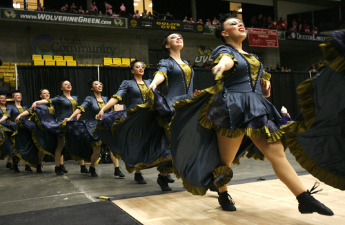 Rick Egan  | The Salt Lake Tribune 

The Hunter high school drill team performs in the 5A State Drill Championships, at  the UCCU Center in Orem, Friday, February 1, 2013.