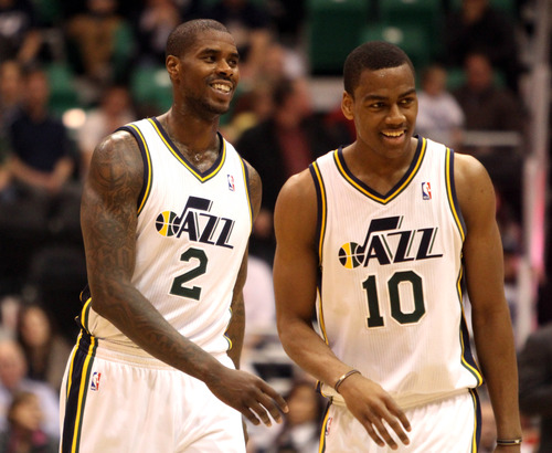 Rick Egan  | The Salt Lake Tribune 

Utah Jazz power forward Marvin Williams (2) and Alec Burks (10) smile  as the Jazz extended their overtime lead to  94-89 with 14 seconds left in the game, in NBA action, Utah vs. Sacramento game, at EnergySolutions Arena, Monday, February 4, 2013.