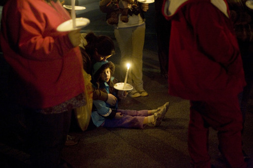 Kim Raff  |  The Salt Lake Tribune
Cheyenne Miller and daughter Brooklyn Miller attend a vigil she organized for the Powell family after the fire at Josh Powell's house that killed him and his two sons, Charlie and Braden. The vigil was held at Oquirrh Hills Elementary in Kearns.