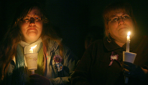 Steve Griffin | The Salt Lake Tribune


 Kiirsi Hellewell, left, a close friend of Susan Powell, and Glenda Ryser weep as they watch a photographic slide show of Powell and her sons, Charlie and Braden, during a vigil at West View Park in West Valley City, Utah Tuesday February 5, 2013. The vigil was to commemorate the one year anniversary of the boy's death.