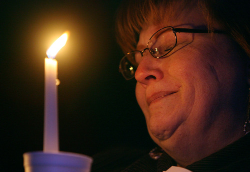 Steve Griffin | The Salt Lake Tribune


 Glenda Ryser weeps as she holds a candle and listens to a song during a vigil for Susan Powell and her sons, Charlie and Braden Powell, at West View Park in West Valley City, Utah Tuesday February 5, 2013. The vigil was to commemorate the one year anniversary of the boy's death.
