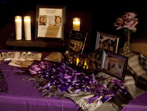 Steve Griffin | The Salt Lake Tribune


Purple ribbons and family photographs of Susan Powell and her sons, Charlie and Braden Powell, cover a table during a vigil to commemorate the one year anniversary of the boy's death. The vigil included songs poems and a slide show at West View Park in West Valley City, Utah Tuesday February 5, 2013.
