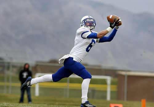 Scott Sommerdorf  |  The Salt Lake Tribune             
Bingham wide receiver Hayden Weichers hauls in a long pass during first half play against Fremont on Nov. 4, 2011. Weichers has committed to play at Utah State.