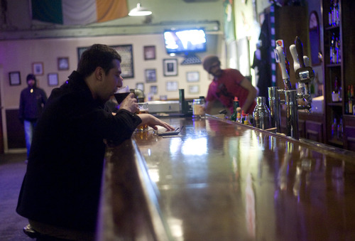 Kim Raff  |  The Salt Lake Tribune
People sit at the bar at the Republican in Salt Lake City on January 3, 2013.