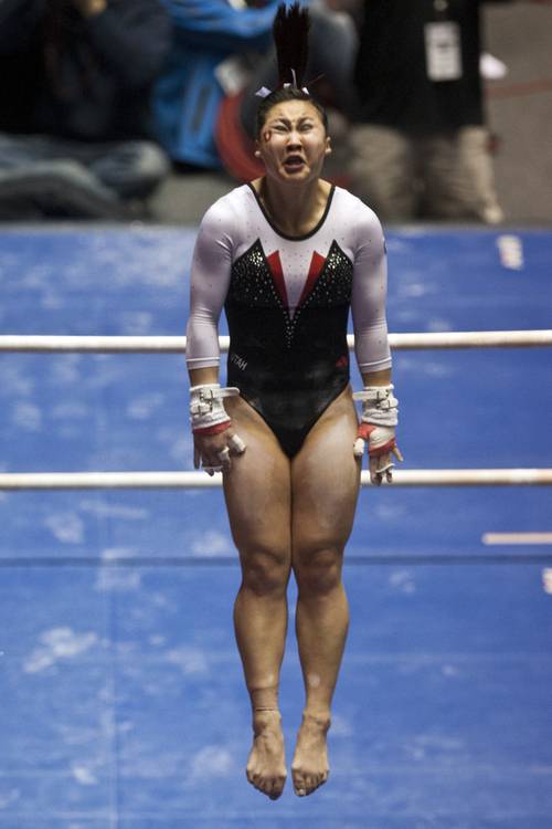 Chris Detrick  |  The Salt Lake Tribune
Utah's Corrie Lothrop competes on the bars during the meet against Arizona State at the Huntsman Center on Friday, Feb. 1, 2013. Utah won 196.425 to 195.450. Lothrop placed second in the event with a score of 9.875.