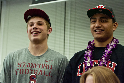 Chris Detrick  |  The Salt Lake Tribune
Sean Barton and Filipo Mokofisi pose for pictures after signing their letter of intent at Woods Cross High School on National Signing Day Wednesday February 6, 2013. Barton will be playing football at Stanford and Mokofisi will be playing football at University of Utah.