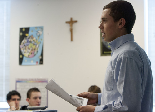 Steve Griffin | The Salt Lake Tribune
Tanner Sands tells his classmates about a family tradition during Nicole Veltri's junior theology class at Juan Diego Catholic High School in Draper on Thursday Jan. 17, 2013.