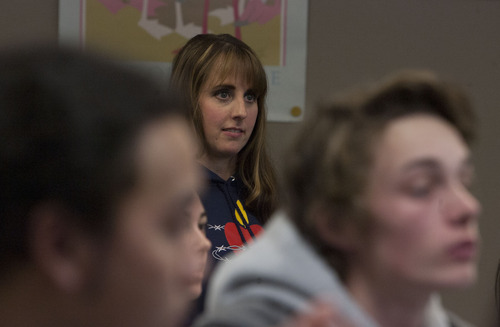 Steve Griffin | The Salt Lake Tribune
Nicole Veltri listens to her students describe their family traditions during her junior theology class at Juan Diego Catholic High School in Draper on Thursday Jan. 17, 2013,