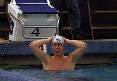 Kim Raff  |  The Salt Lake Tribune
Nathan Bramhall, of Pleasant Grove High School reacts to placing first in the 50 yard freestyle during the Utah High School State 5A Championship swim meet at the Stephen L. Richards Building on the BYU campus in Provo on February 7, 2013.
