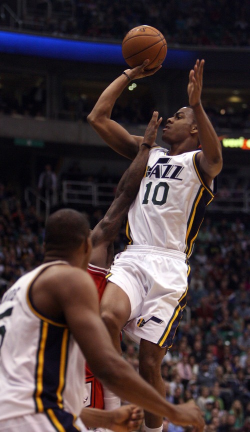 Kim Raff  |  The Salt Lake Tribune
Utah Jazz point guard Alec Burks (10) takes a shot during the second half against the Chicago Bulls at EnergySolutions Arena in Salt Lake City on February 8, 2013. Jazz went on to lose the game 93-89.