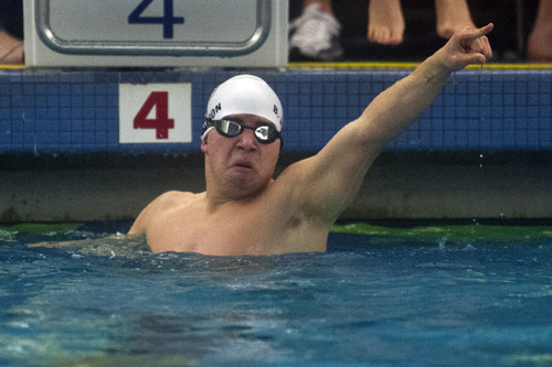 Chris Detrick  |  The Salt Lake Tribune
Brandon Johnson, of Tooele High School, celebrates after winning the 100 yard butterfly during the Utah High School State 3A Championships at BYU Saturday February 9, 2013.
