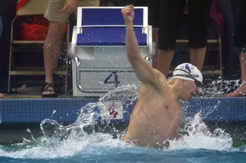 Chris Detrick  |  The Salt Lake Tribune
Brandon Johnson, of Tooele High School, celebrates after winning the 100 yard butterfly during the Utah High School State 3A Championships at BYU Saturday February 9, 2013.