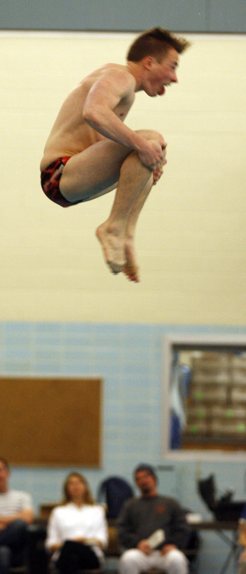 Rick Egan  | The Salt Lake Tribune 

Nathan Makarewicz dives for West High in the High School State Diving competition at BYU, Thursday, February 7, 2013.