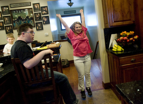 Kim Raff  |  The Salt Lake Tribune
Annie Simmons hangs out with her siblings Denney, left, and Jack Simmons at their home in Kamas on January 24, 2013.  John and Amy Simmons have nine children with five adopted from Russia, including Annie and Denney.