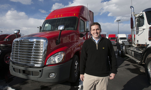 Steve Griffin | The Salt Lake Tribune


Buzz Warner, of Warner Truck Center in West Vally City, Utah, stands in a row of new Freightliners Thursday January 10, 2013. The truck center is home to transportation-related businesses that sell, maintain, repair and customize heavy- and light-duty vehicles,