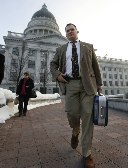 Scott Sommerdorf   |  The Salt Lake Tribune
After a day on the hill, Clark Aposhian leaves the capitol complex, Wednesday, February 6, 2013. Aposhian spends long days advocating for gun rights at the capitol during the legislative session.