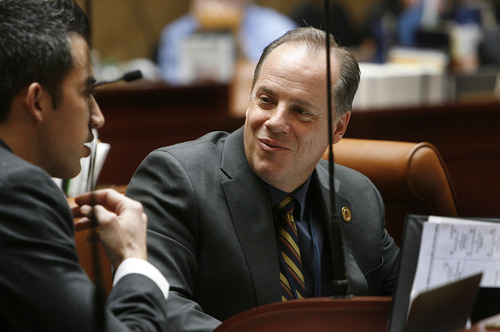 Scott Sommerdorf   |  The Salt Lake Tribune
Rep. Brian Greene, R-Pleasant Grove, speaks with Rep. Marc Roberts, R-Santaquin, left, in the Utah House of Representatives, Wednesday, February 6, 2013. Greene is the sponsor of HB114 - Second Amendment Preservation Act - that was introduced Tuesday.