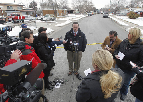 Al Hartmann  |  The Salt Lake Tribune
Unified Police Lt. Justin Hoyal says Tuesday that David Fresques, a person of interest in a Midvale triple homicide, is still at large. Up to 80 officers are involved in a manhunt.