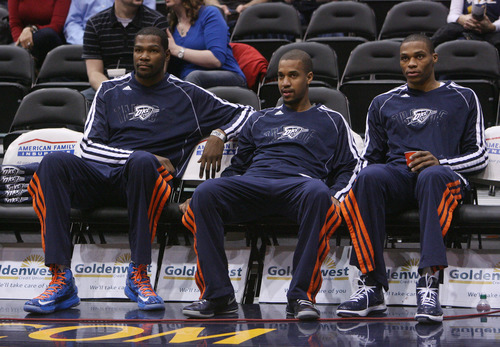 Steve Griffin | The Salt Lake Tribune


The Thunder's Kevin Durant, Eric Maynor and Russel Westbrook watch from the bench during warm-ups before a game against the Utah Jazz in Salt Lake City on Tuesday, Feb. 12, 2013.