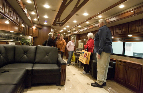 Paul Fraughton  |   Salt Lake Tribune
Visitors to the Utah Sportsman's Vacation and RV Show check out the interior of one of the more  high end motor homes, The Ellipse,  with a MSRP of $380,000.00.The show, at the  South Towne Expo Center continues through Sunday. 
 Thursday, February 14, 2013
