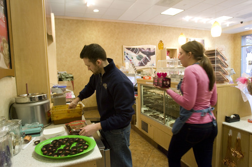 Kim Raff  |  The Salt Lake Tribune
Matt Canaday and Allie Humphrey, prepping treats earlier this week at Rocky Mountain Chocolate Factory in Lehi, opened their shop last fall.