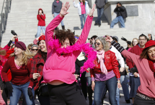 Al Hartmann  |  The Salt Lake Tribune
About 100 dancers do zumba dance moves on the south steps of the Utah State Capitol Thursday February 14 to raise awareness about violence against girls and women. Hundreds of dance demonstrations took place around the world for "One Billion Rising" a campaign on Valentine's Day to end violence against women and girls. It was sponsored by the YWCA and other nonprofits.