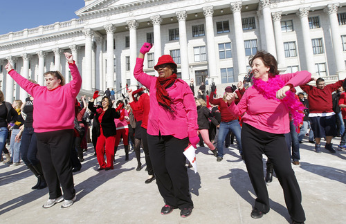 Al Hartmann  |  The Salt Lake Tribune
About 100 dancers do zumba dance moves on the south steps of the Utah State Capitol Thursday February 14 to raise awareness about violence against girls and women. Hundreds of dance demonstrations took place around the world for "One Billion Rising"  on Valentine's Day to end violence against women and girls. It was sponsored by the YWCA and other nonprofits.