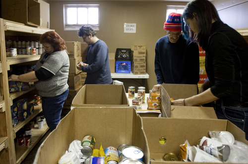 Kim Raff  |  The Salt Lake Tribune
Volunteers sort and shelve boxes of food at Jesus Feeds Food Bank at The Church at Liberty Park in Salt Lake City on February 14, 2013. Utah generated a lot of jobs last year but still there is a growing need at area food banks.