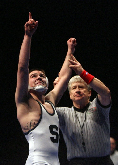 Kim Raff  |  The Salt Lake Tribune
Zane Rich of Syracuse celebrates defeating Jed Diederich of Cottonwood during the 138 pound weight class match during the 5A State Wrestling Championship at the UCCU Center at Utah Valley University in Orem on February 14, 2013.