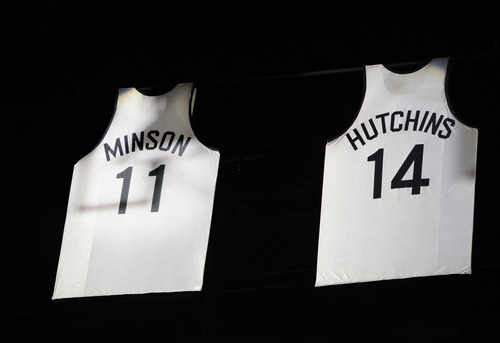 Rick Egan  | The Salt Lake Tribune 

Former Brigham Young Cougars players Roland Minson and Mel Hutchins had their jerseys retired at halftime of the BYU, Portland basketball game at the Marriott Center, Saturday, February 16, 2013.