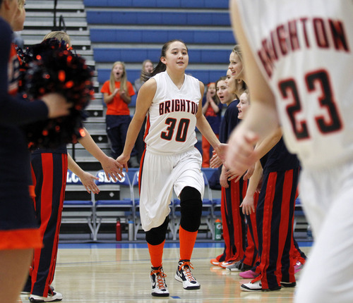 Al Hartmann  |  The Salt Lake Tribune
Brighton's Maddie Chin takes the floor to start the 5A girls' playoff game between Riverton High School and Brighton High School at Salt Lake Community College Monday February 18.