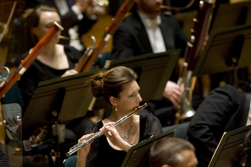 Kim Raff  |  The Salt Lake Tribune
(middle) Flutist Mercedes Smith plays in the Utah Symphony during a performance at Abravanel Hall in Salt Lake City on February 15, 2012.
