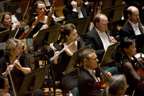 Kim Raff  |  The Salt Lake Tribune
(middle) Flutist Mercedes Smith plays in the Utah Symphony during a performance at Abravanel Hall in Salt Lake City on February 15, 2012.