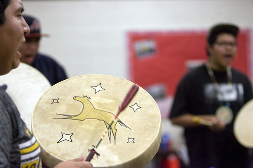 Kim Raff  |  The Salt Lake Tribune
(left) Adrian Eagle Hawk performs during a Round Dance, organized by members of the Ute Indian Tribe, at Uinta River High School in Fort Duchesne on February 9, 2013.