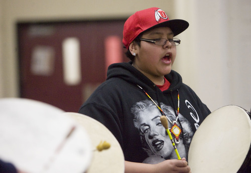 Kim Raff  |  The Salt Lake Tribune
Bode Kamai, 13, performs with other drummers during a Round Dance, organized by members of the Ute Indian Tribe, at Uinta River High School in Fort Duchesne on February 9, 2013.