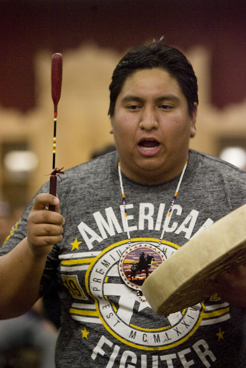 Kim Raff  |  The Salt Lake Tribune
Adrian Eagle Hawk performs during a Round Dance, organized by members of the Ute Indian Tribe, at Uinta River High School in Fort Duchesne on February 9, 2013.
