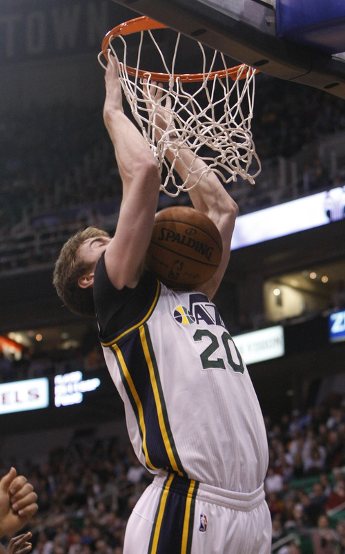 Chris Detrick  |  The Salt Lake Tribune
Utah Jazz shooting guard Gordon Hayward (20) dunks the ball during the first half of the game at EnergySolutions Arena Tuesday February 19, 2013. The Jazz are winning the game 58-53.