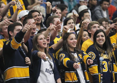 Al Hartmann  |  The Salt Lake Tribune
Bonneville High School students cheer on their team that's playing against Maple Mountain High School during a Girl's 4A play off game at Salt Lake Community College Tuesday February 19.