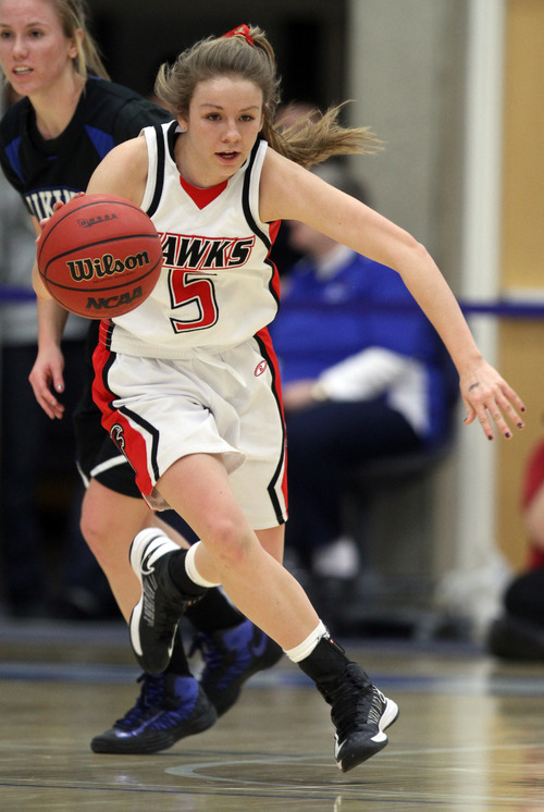 Rick Egan  | The Salt Lake Tribune 

Rachel Jensen leads a fast break for the Hawks, in the girls state 5A basketball tournament, Alta vs. Pleasant Grove, in Taylorsville, Monday, February 18, 2013.
