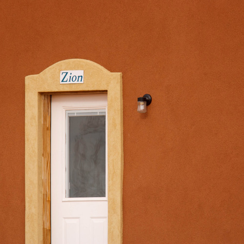 Trent Nelson  |  The Salt Lake Tribune
The word Zion, appearing over the door of a home in Hildale, Friday, November 30, 2012.