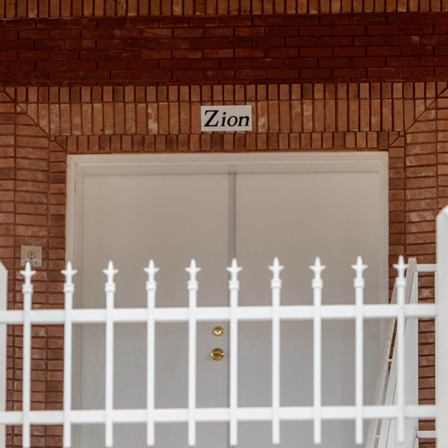 Trent Nelson  |  The Salt Lake Tribune
The word Zion, appearing over the door of a large home in Hildale, Friday, November 30, 2012.
