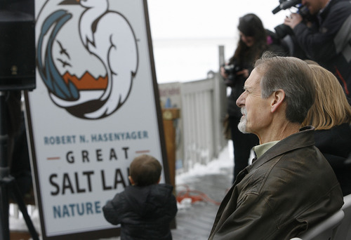Scott Sommerdorf   |  The Salt Lake Tribune
Bob Hasenyager admires the new sign unveiled at the ceremony to rename the Great Salt Lake Nature Center in his honor, Saturday, February 9, 2013. Hasenyager is a former DWR employee and the executive director of the Utah Wildlife in Need (UWIN) Foundation.