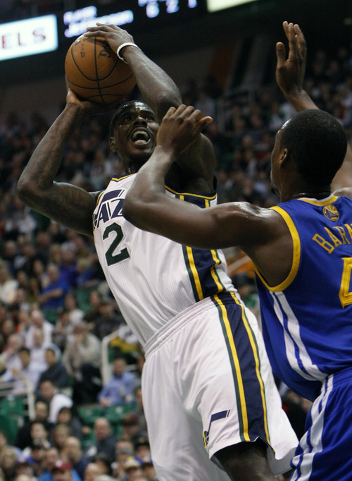 Chris Detrick  |  The Salt Lake Tribune
Utah Jazz power forward Marvin Williams (2) shoots over Golden State Warriors small forward Harrison Barnes (40) during the first half of the game at EnergySolutions Arena Tuesday February 19, 2013. The Jazz are winning the game 58-53.