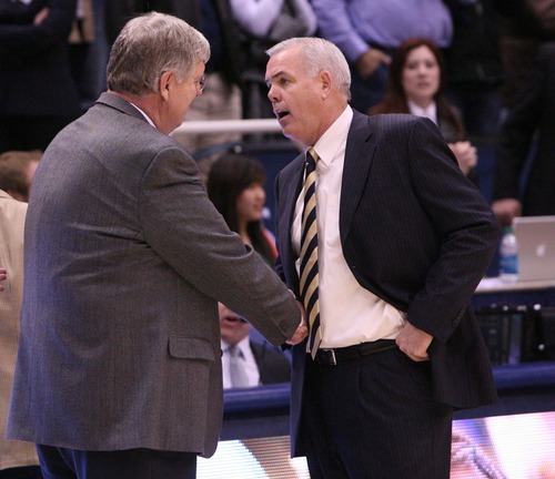 Leah Hogsten  |  The Salt Lake Tribune
Brigham Young Cougars head coach Dave Rose and Utah State Aggies head coach Stew Morrill after the game. Brigham Young University Cougars defeated Utah State University Aggies 70-68 in Provo, February 19, 2013.