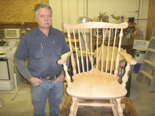 Tom Wharton  |  The Salt Lake Tribune
Robert Donio shows off an antique rocking chair he is working to restore at The Stripper in South Salt Lake.