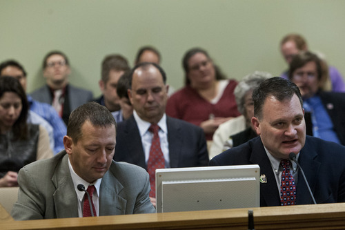 Chris Detrick  |  The Salt Lake Tribune
Clark Aposhian, chairman of the Utah Shooting Sports Council, speaks about HB268 Disorderly Conduct Amendments, during a House Law Enforcement and Criminal Justice Committee meeting Wednesday February 20, 2013. At left is Representative Paul Ray, R-Clearfield.